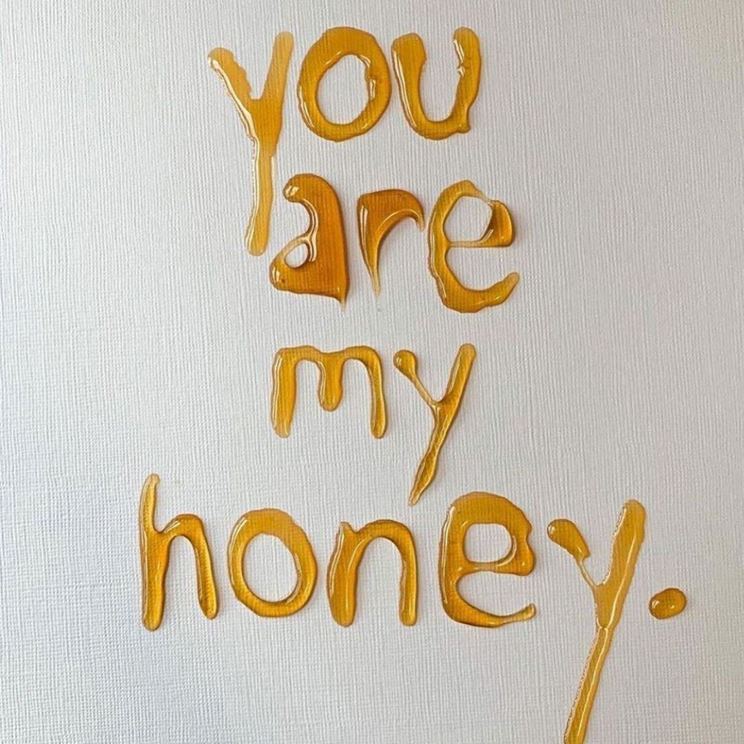 The words 'you are my honey' written in honey